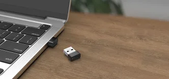 Na zdjęciu karta sieciowa Wi-Fi podłączana przez USB - Mercusys MA14N.